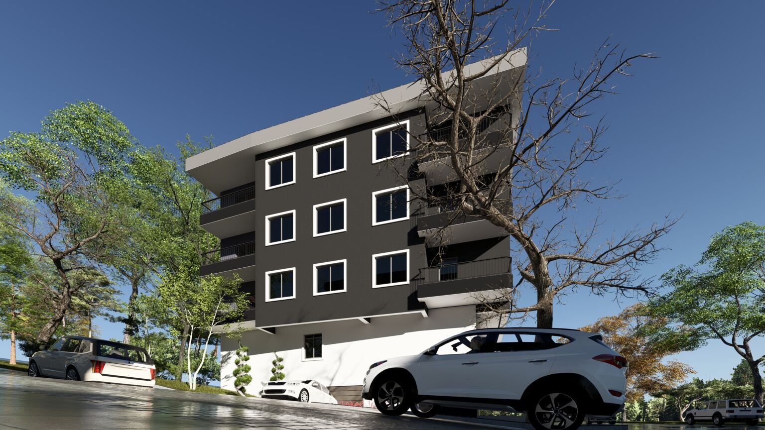 Ezine Apartmanı’nın koyu gri cephesini, balkonlarını ve ağaçlarla çevrili sokaktaki park hâlindeki araçları gösteren alçak açılı görselleştirme.
