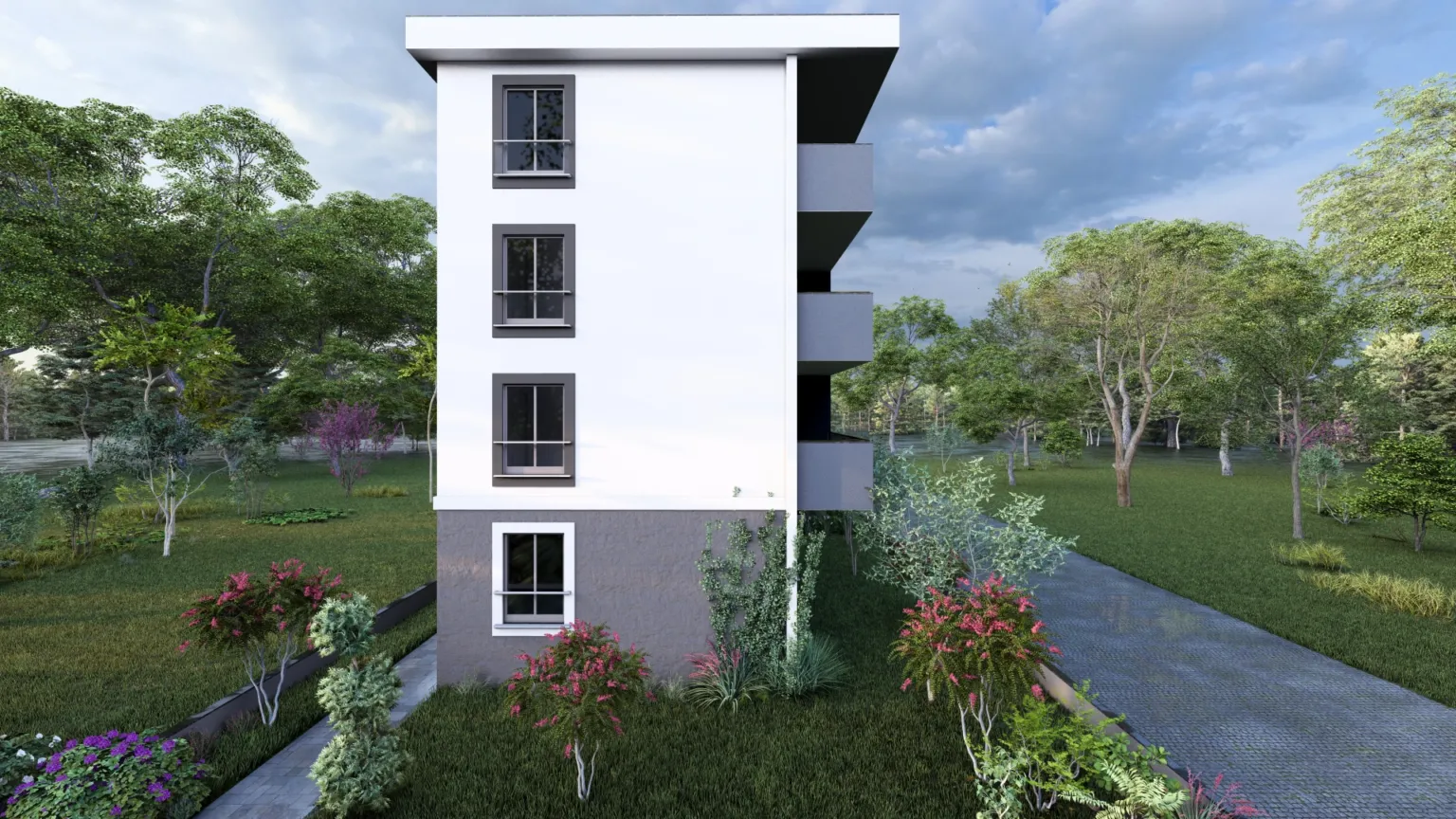 Narrow side elevation of a four-story apartment building with a white façade, vertically aligned windows, and landscaped greenery around the property.